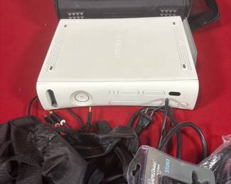 Xbox 360 console with carrying case and accessories