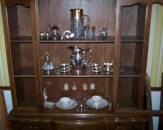 SILVER-PLATE ITEMS IN FRENCH PROVINCIAL CHINA CABINET