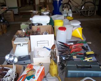 TABLES OF MISC. IN THE GARAGE