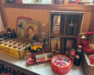 1960s Coca Cola Yellow Wooden Bottle Crate, 1960s Coca Cola One Gallon Glass Fountain Syrup Jug, Vintage Coca Cola Bottles, 1993 Coca Cola Die Cast Metal Bank Delivery Truck, Circa 1970s Buddy L Coca Cola Delivery Truck