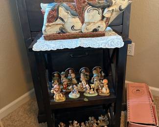 Carved wooden lucky ox and a collection of Hummels 