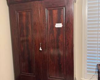 Antique 8’ flame grained mahogany  armoire from New Orleans, possibly a plantation