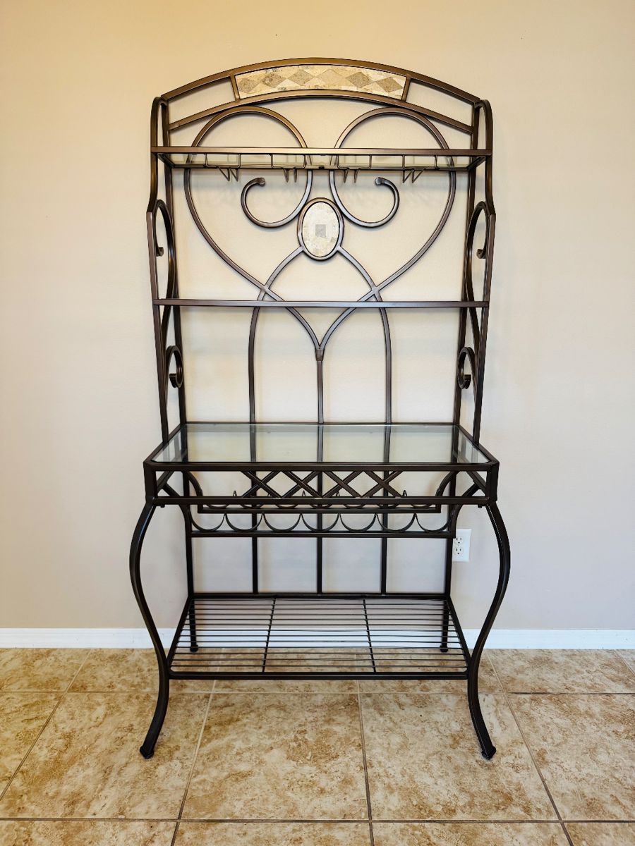 Baker’s Wine Rack
Elegant metal and wood baker’s rack with integrated wine storage. Features multiple shelves for display or storage and a lower wine rack section. Sturdy construction and stylish design — perfect for kitchen, dining, or entertaining space.