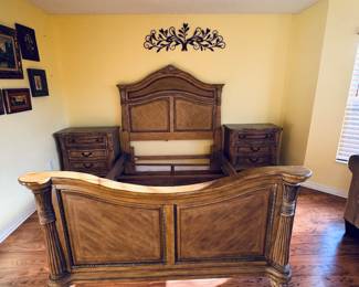 Tommy Bahama–Style Queen Bedroom Set
Elegant tropical design featuring carved pineapple and palm leaf motifs. Includes queen headboard, footboard, and side rails, plus two marble-top nightstands and a matching chifferobe. Beautiful craftsmanship and coastal island flair — excellent condition.