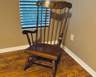 Vintage Nichols & Stone Windsor Style Rocking Chair
Classic New England craftsmanship with traditional spindle back and stenciled floral design. Solid wood construction, gently aged patina, and smooth rocking motion. A true vintage collectible in excellent condition.