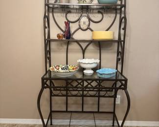 Baker’s Wine Rack
Elegant metal and wood baker’s rack with integrated wine storage. Features multiple shelves for display or storage and a lower wine rack section. Sturdy construction and stylish design — perfect for kitchen, dining, or entertaining space.
