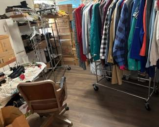 More clothes, more shoes, boxes of clothes, bags of clothes