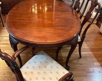 Dining room set, table with leaves, pads and 6 chairs, & breakfront