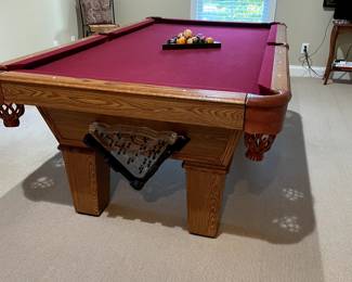 Olhausen  7 ft slate top full size pool table and accessories. Must be moved and set up professionaly.
