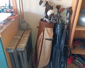 Golf clubs and sawhorses