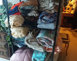 Lots of blankets, quilts and sheets