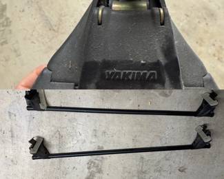 Yakima roof rack bars for sports utility vehicle to carry windsurf boards or other outdoor equipment.  