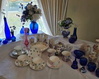 Decorative Collection Of Display Items And Tea Pot Cups