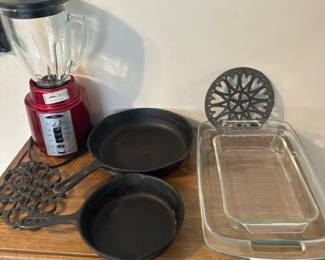 Cast Iron Skillets, Oster Blender, Glass Bakeware  Trivets