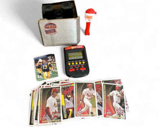 Mixed Collectibles  Sports Cards, Electronic Yahtzee, Santa Pez, and ViewMaster Reels