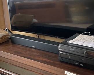 Bose sound bar, dvd player, vhs player
