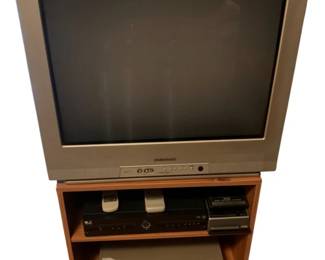 54 - Sylvania TV w/ DVD/VCR & Stand - 27" screen used as-is electric/electronic/mechanical item - no guarantee all components, untested.
