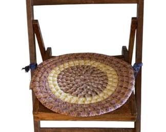 118 - Folding Wooden Chair w/ braided seat pad 18 x 33 x 17
