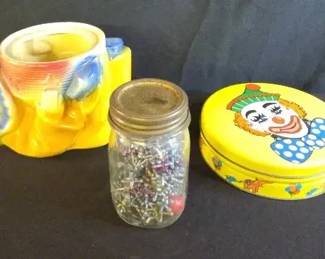 Shawnee Pottery Cookie Jar, Clown Tin, And Vintage Jacks