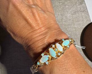 #30J - $1850 - Opal & 14kt yellow gold bangle - 19gr. 