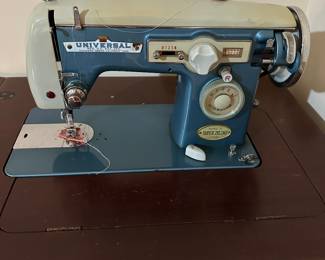 #89 - $ - Sewing cabinet with Universal standard sewing machine Co. Model Z super Zigzag made in Japan

