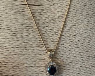 #34J - $900 - 14Kt  yellow gold snake chain & sapphire pendant (3.2gr)- Chain 18"long (4.2gr)