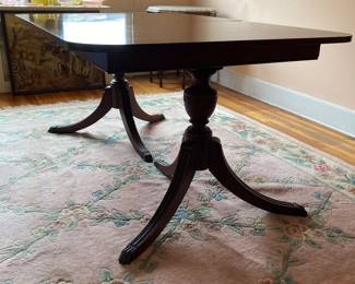 Vintage Duncan Phyfe style dining table great condition with on 18" leaf. Table without leaf is 42W-62L. $150