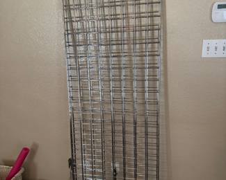 3 grid pieces that fit on triangular base with wheels