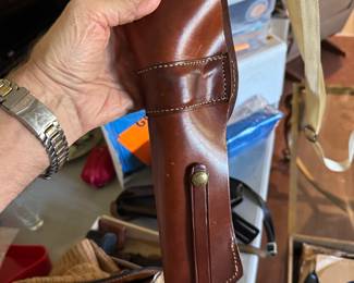 I think it’s a gun holster,,, but maybe you crafters can keep your hot glue gun in it