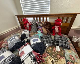 Brand new blankets, fun stuffed animals (the squirrel is kinda nuts, so watch out for him!) and the head board matches the dresser, and bed side tables