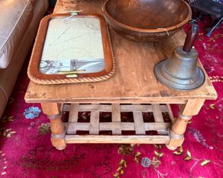 Large Colorful Rug with Coffee Table with Woven Shelf, Large Wooden Bowls, and Vintage Bell, and more...