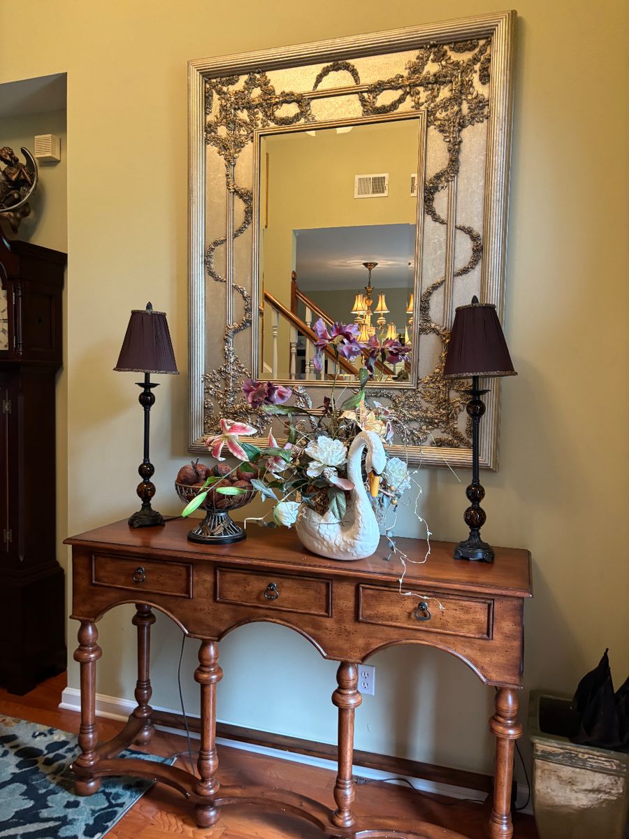 Wooden console table with 3 drawers       Decorative wall mirror        lamps 
