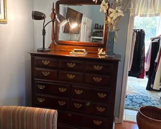 dresser with mirror chairs area rug