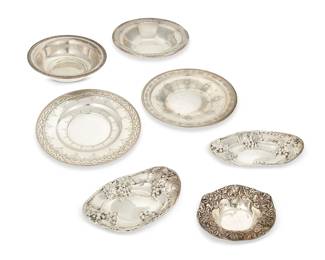 1348
A group of sterling silver dishes and bowls
20th century
Each marked for sterling and variously marked for maker
Comprising three repoussé decorated dishes, two pierced bowls, and two plates from various makers such as Gorham, Towle, and Meriden
7 pieces
Largest: 10.25" Dia.; Smallest: 7.375" Dia.
50.4 oz. troy approximately
Estimate: $300 - $500