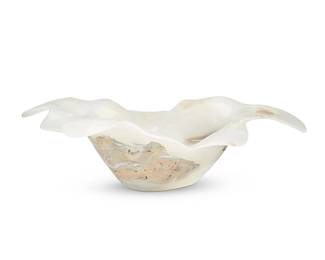 1428
An onyx specimen bowl
20th/early 21st century
With opaque center well and semi-translucent shaped rim
8.25" H x 30" W x 23.25" D
28 lbs.
Estimate: $300 - $500