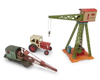 1440
A group of toys including a tractor and two cranes
20th century
Train car marked: Lionel Lines / No. 219
Comprising an enameled metal ERTL model of an International Harvester 1466 Turbo tractor, a metal Lionel model 219 standard gauge crane car for a train set, with articulated arm, and a T-Reproductions Dorfan no. 70 crane, electrified
3 pieces
Crane: 19.5" H x 18.5" W x 10.5" D; Tractor: 7.25" H x 10" W x 5.75" D
Estimate: $200 - $300