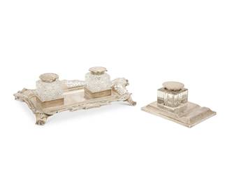 1350
Two English sterling silver and glass inkstands
Early 20th century
Each marked for sterling; the pair marked for London, dated 1905, and for maker: G J D F [Josiah Williams & Co (George Maudsley Jackson & David Landsborough Fullerton)]; the single marked for Birmingham, dated 1920, and maker: D F [Deakin & Francis]
Comprising two ink wells with sterling caps, set into a base with pierced scroll design, and a single well with sterling lid, set in an architectural base
2 pieces
Pair overall: 2.625" H x 9.75" W x 6" D; Single overall: 2.125" H x 4.625" W x 3.625" D
Weighable sterling: 15.6 oz. troy approximately
Estimate: $300 - $400