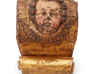 1378
A Continental carved giltwood wall decoration
17th/18th century
With central putto on giltwood with wrought iron hanging hook
9.75" H x 6.75" W x 5" D
Estimate: $200 - $300