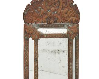 1382
A Spanish Revival-style tole framed mirror
19th/20th century
The frame with repoussé scroll and floral motifs
20.25" H x 10.75" W x 1.75" D
Estimate: $100 - $200