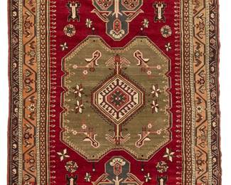 1422
A Turkish rug
Mid-20th century
Wool on cotton foundation
10' 4" L x 4' 10" W
Estimate: $300 - $500