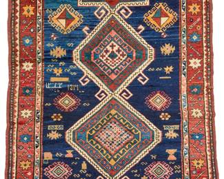 1413
A Caucasian area rug
Mid-20th century
Wool on wool foundation
7' 1" L x 4' W
Estimate: $300 - $500