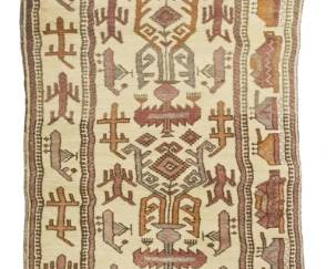 1420
A Caucasian-style geometric runner
Late 20th century
Wool on cotton foundation
14' 4" L x 2' 3" W
Estimate: $200 - $400