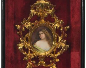 1366
A late 19th/early 20th century German porcelain miniature portrait
Depicting a lady, painted on porcelain, presented within a Florentine giltwood frame
Sight of porcelain: 3" H x 2.5" W; Florentine giltwood frame: 8" H x 6.5" W
Estimate: $100 - $200