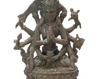 1408
A South Asian bronze figure of a benevolent deity
19th century or later
Possibly Nepalese, and possibly depicting Manjusri, the cast figure seated with twelve arms holding various objects and implements
5.5" H x 4" W x 2.75" D
Estimate: $500 - $700