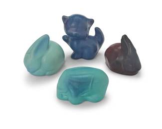 1437
Four Van Briggle pottery animal figures
20th century
Each variously marked for Van Briggle; one incised possibly with date: 1917
The glazed pottery items comprising two rabbits, one cat, and one elephant
4 pieces
Tallest: 3.5" H x 3" W x 2" D; Shortest: 2" H x 3.375" W x 1.75" D
Estimate: $150 - $250