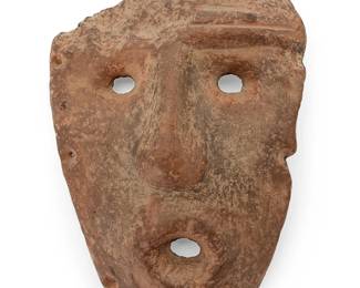 1459
A Pre-Columbian-style cast ceramic mask
Late 20th century
With metal label verso: [logo] / MPA / 8 / 206
Replicated after a Condorhuasi-Alamito mask in the collection of the Museo de la Plata in Argentina, the partial funerary mask with perforation to each side, set on an acrylic stand
Mask: 8.375" H x 5.5" W x 2.5" D; Stand: 7.25" H x 7.5" W x 4.25" D
Estimate: $300 - $500