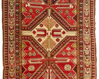 1416
A geometric area rug
20th century
Wool on cotton foundation
6' 9.5" L x 4' 1.5" W
Estimate: $300 - $500