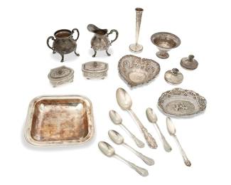 1340
An assorted group of silver items
Late 19th/20th century
Four items marked for sterling; one pierced bowl marked for .800 silver; square dish spuriously marked: argento / 925%; most variously marked for maker
Comprising a cream and sugar set, two pierced bowls, a square dish, a weighted bud vase, a weighted compote, tablespoons, and two associated lids, some personalized
Together with non-silver items: two felt-lined trinket boxes and five spoons
15 pieces
Square bowl: 1.375" H x 7.375" W x 7.375" D; Bud vase: 7.125" H
Weighable silver: 34.5 oz. troy approximately
Estimate: $1,200 - $1,800