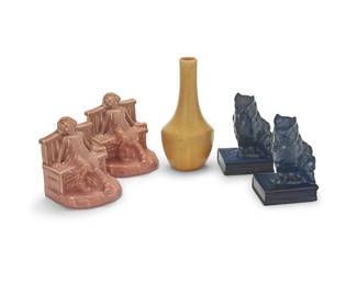 1434
A group of Rookwood pottery items
1910-1929
Each marked for Rookwood and variously dated; additionally variously numbered: 1697 / 2446 / 2655
Comprising a pair of blue owl-form bookends, another pair of bookends depicting a girl seated on a bench, and a yellow vase
5 pieces
Vase: 8.25" H x 3.375" Dia. Each girl figure bookend: 5.375" H x 4.625" W x 4.5" D
Estimate: $200 - $300