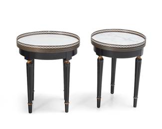 1367
A pair of Louis XVI-style side tables
Late 20th century
The round marble tops with brass openwork gallery, raised on tapered fluted legs with toupie feet
2 pieces
Each: 18.25" H x 15.25" W x 12.75" D
Estimate: $200 - $300